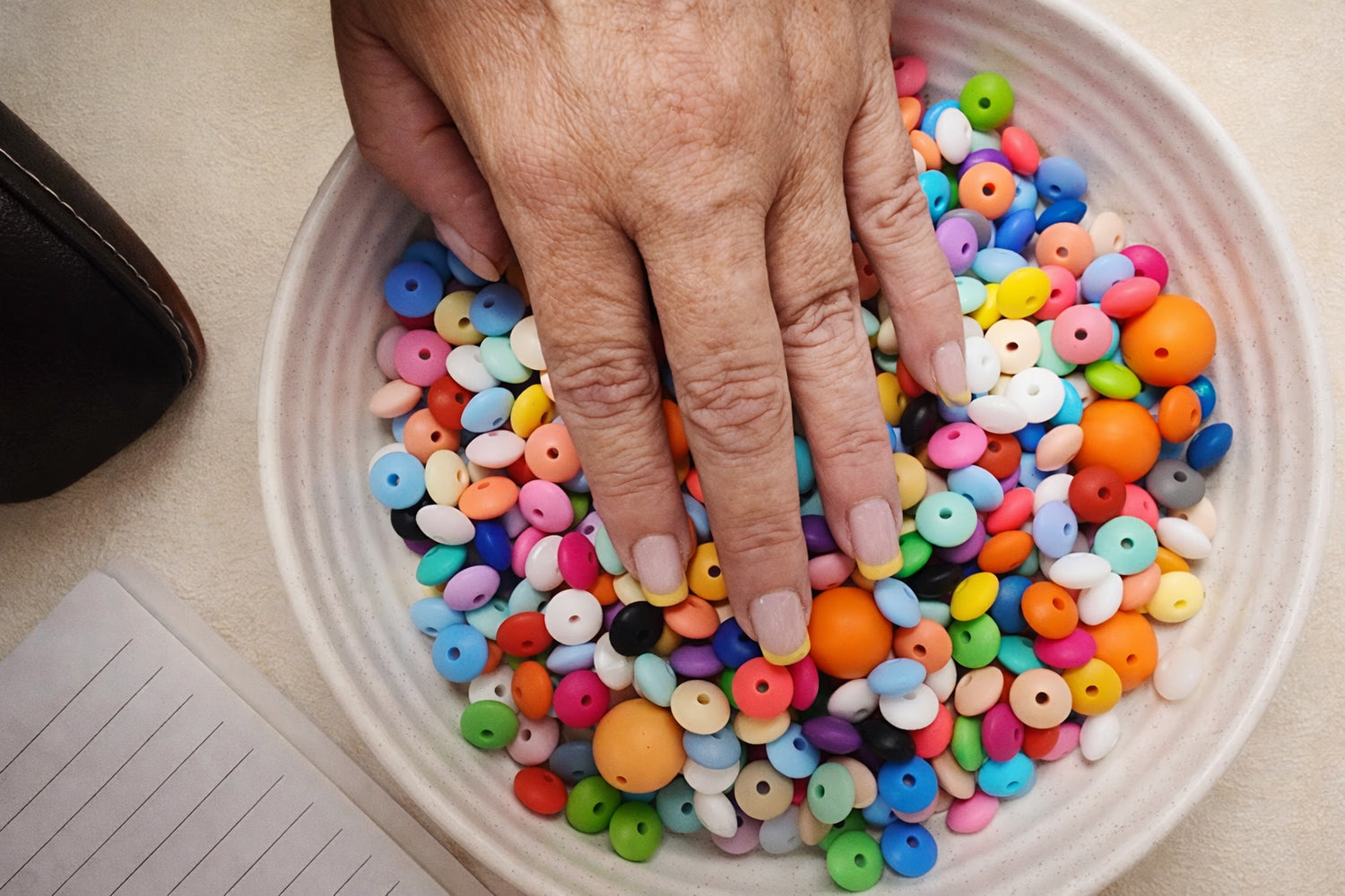 Close-up of colourful craft beads at The Wired Yarn & Beads